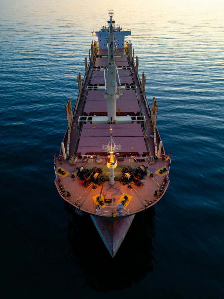 Large bulk carrier cargo ship Floating on Vast Water